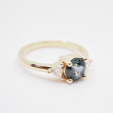 14k Montana Sapphire Round with Trillion Diamonds