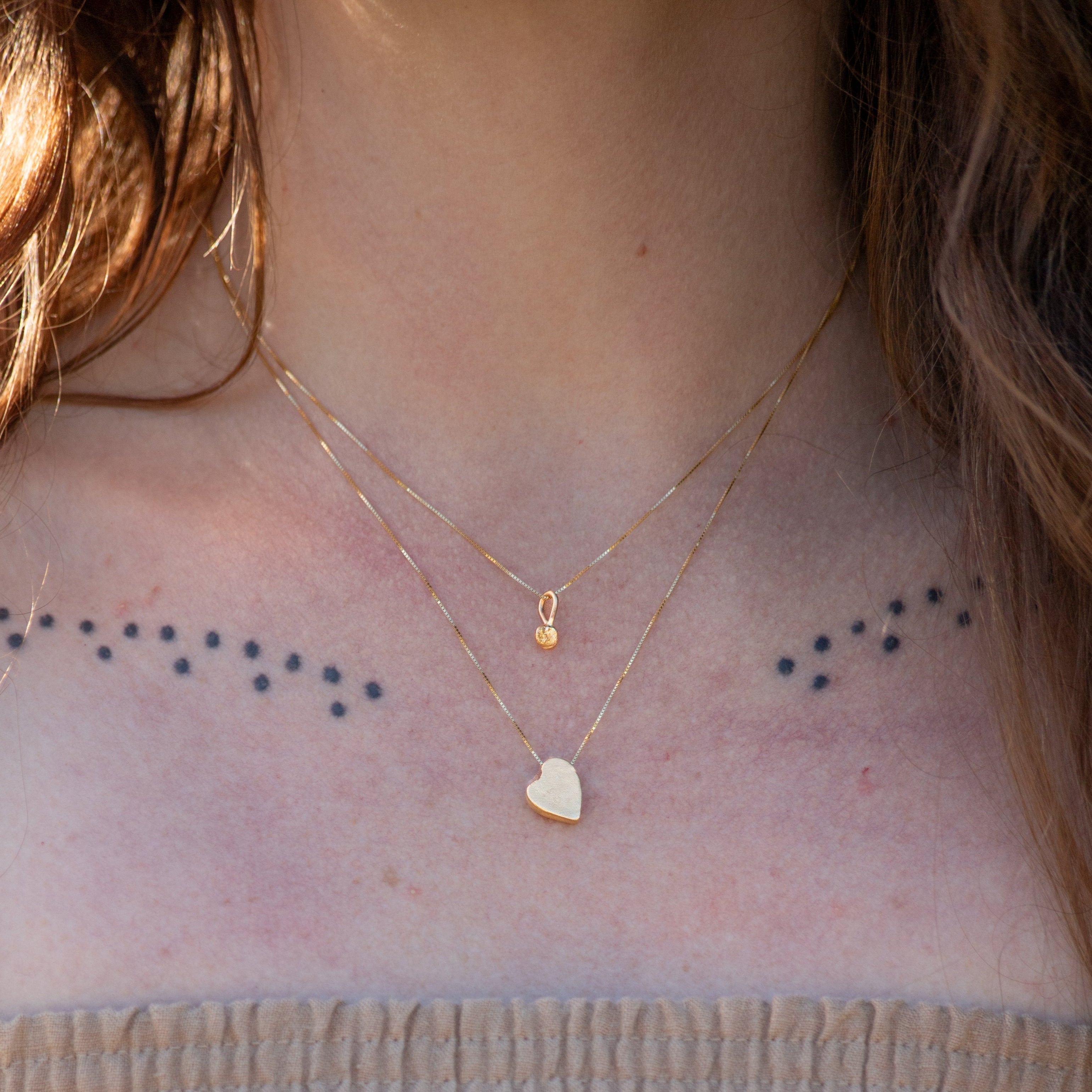 Pendant necklaces and signet rings