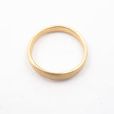 Gold ring on a white background