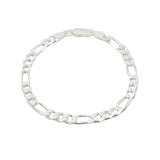 Silver chain bracelet on a light gray background