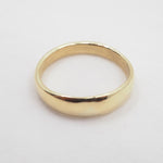 Gold ring on a white background