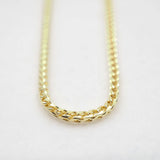 Gold chain necklace on a white background