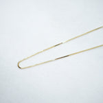 Gold chain on a white background