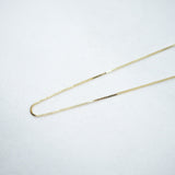 Gold chain on a white background